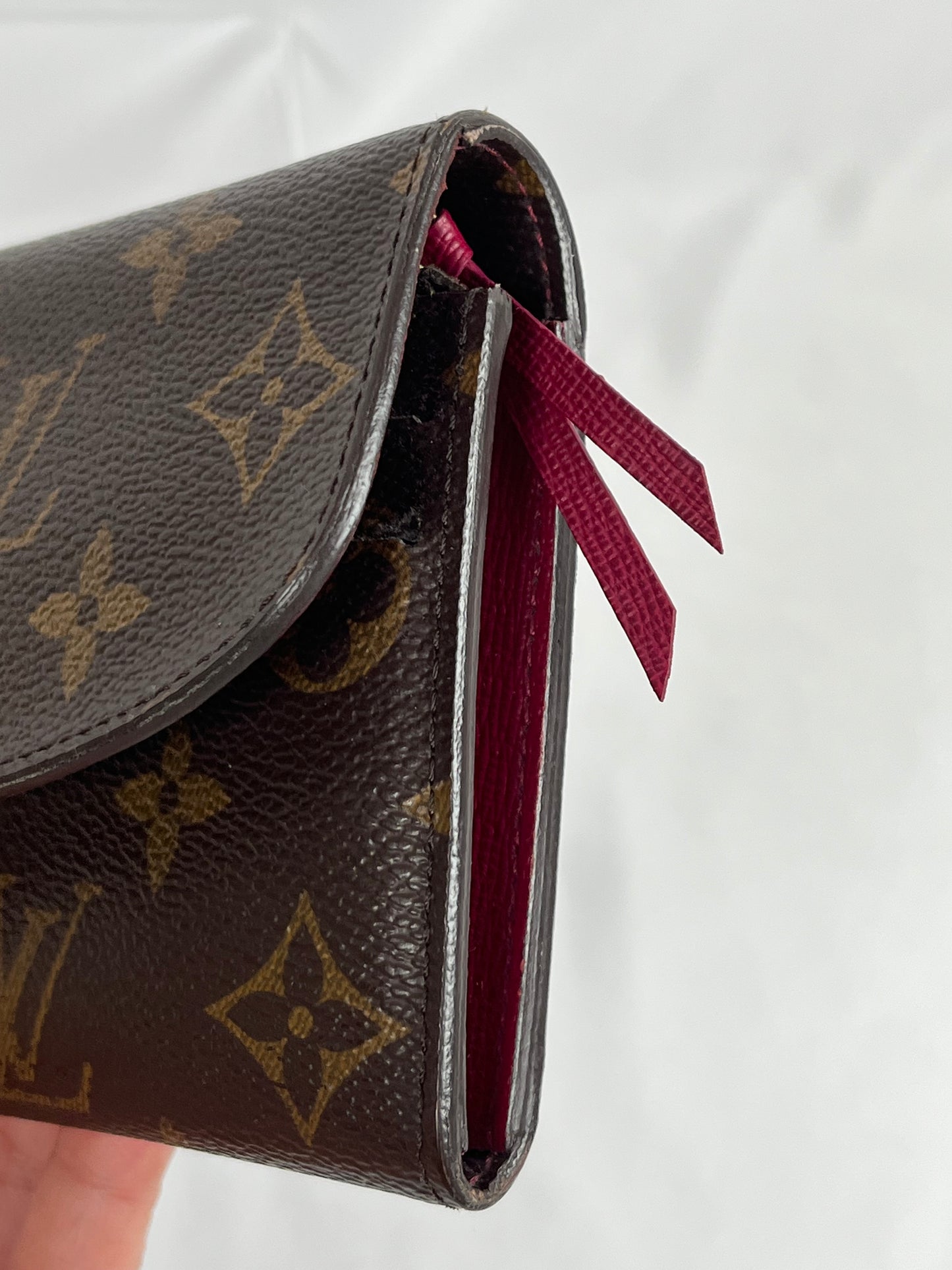 Pre-Owned LOUIS VUITTON Emilie Monogram/Fuschia Wallet