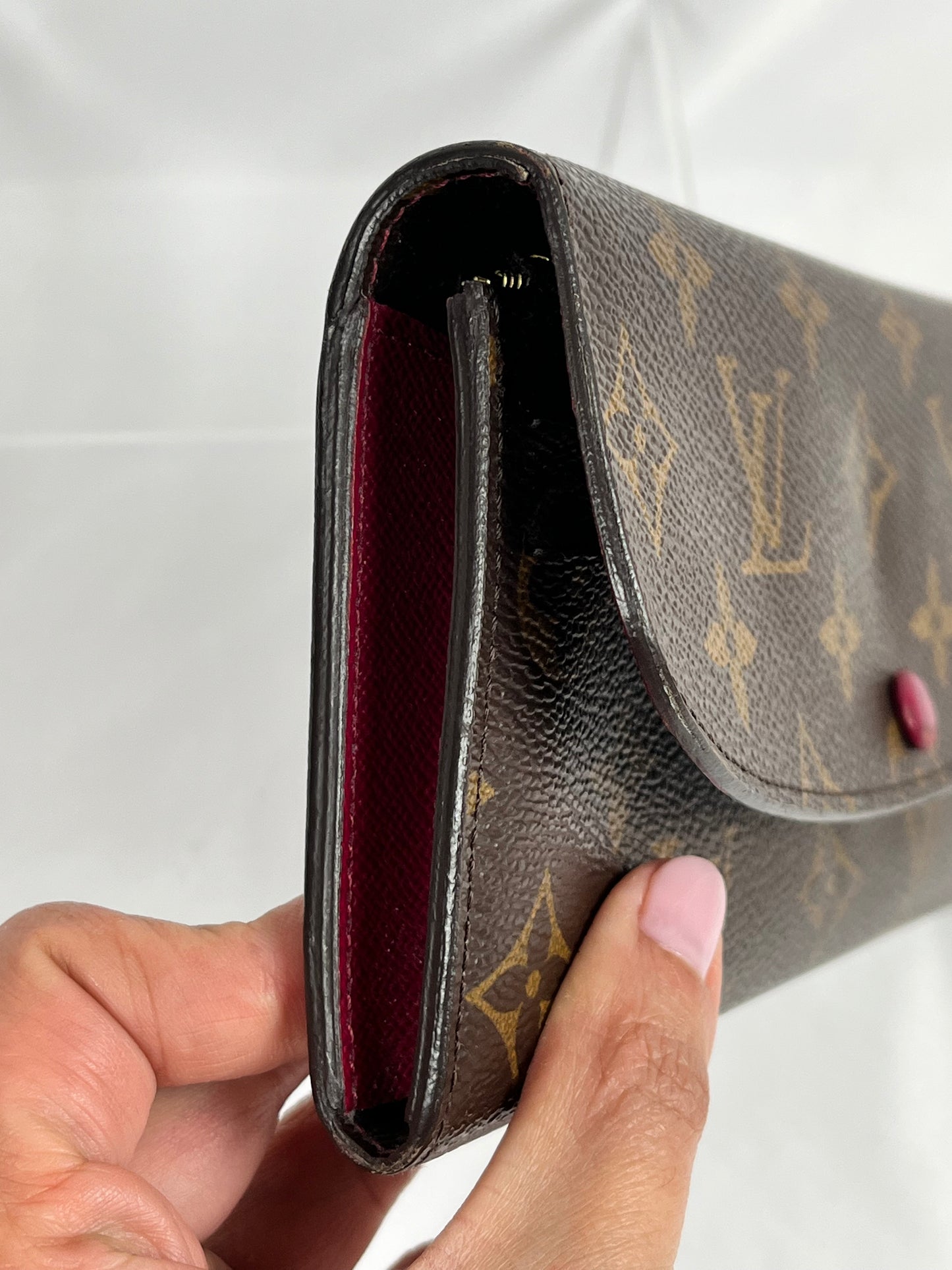 Pre-Owned LOUIS VUITTON Emilie Monogram/Fuschia Wallet