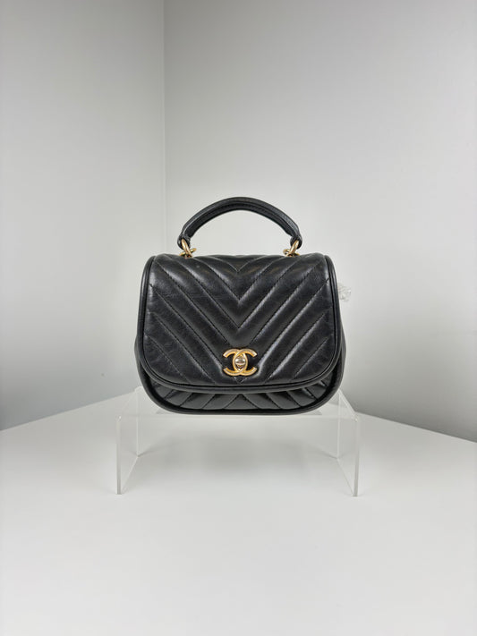 Pre-Owned CHANEL™ Reverse Chevron Top Handl Handbag, Black/GHW, Mini