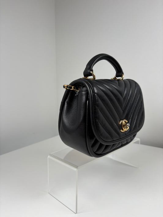 Pre-Owned CHANEL™ Reverse Chevron Top Handl Handbag, Black/GHW, Mini