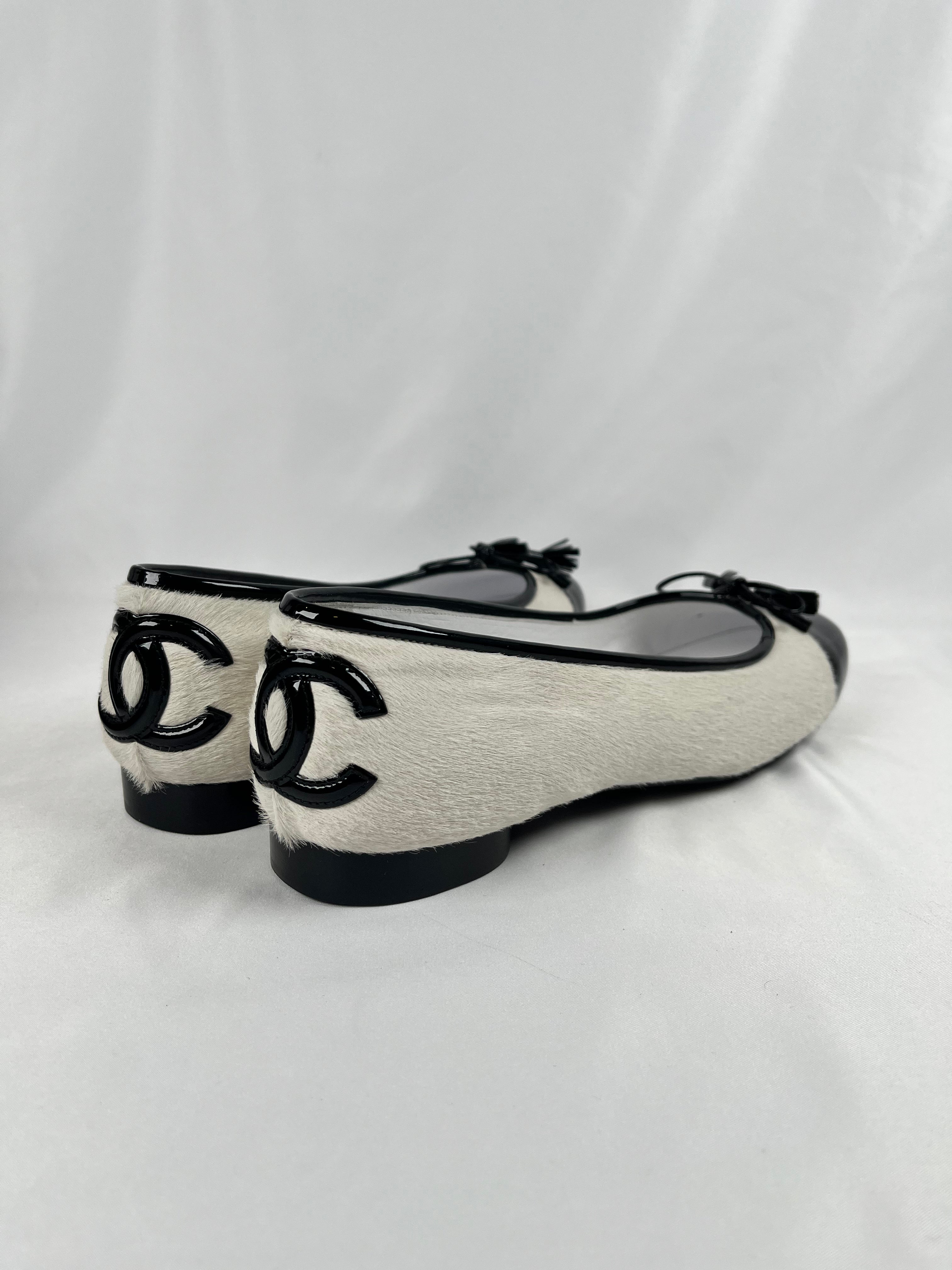 Pre-Owned CHANEL™ Pony Hair Cap Toe Black/White Flats, 40