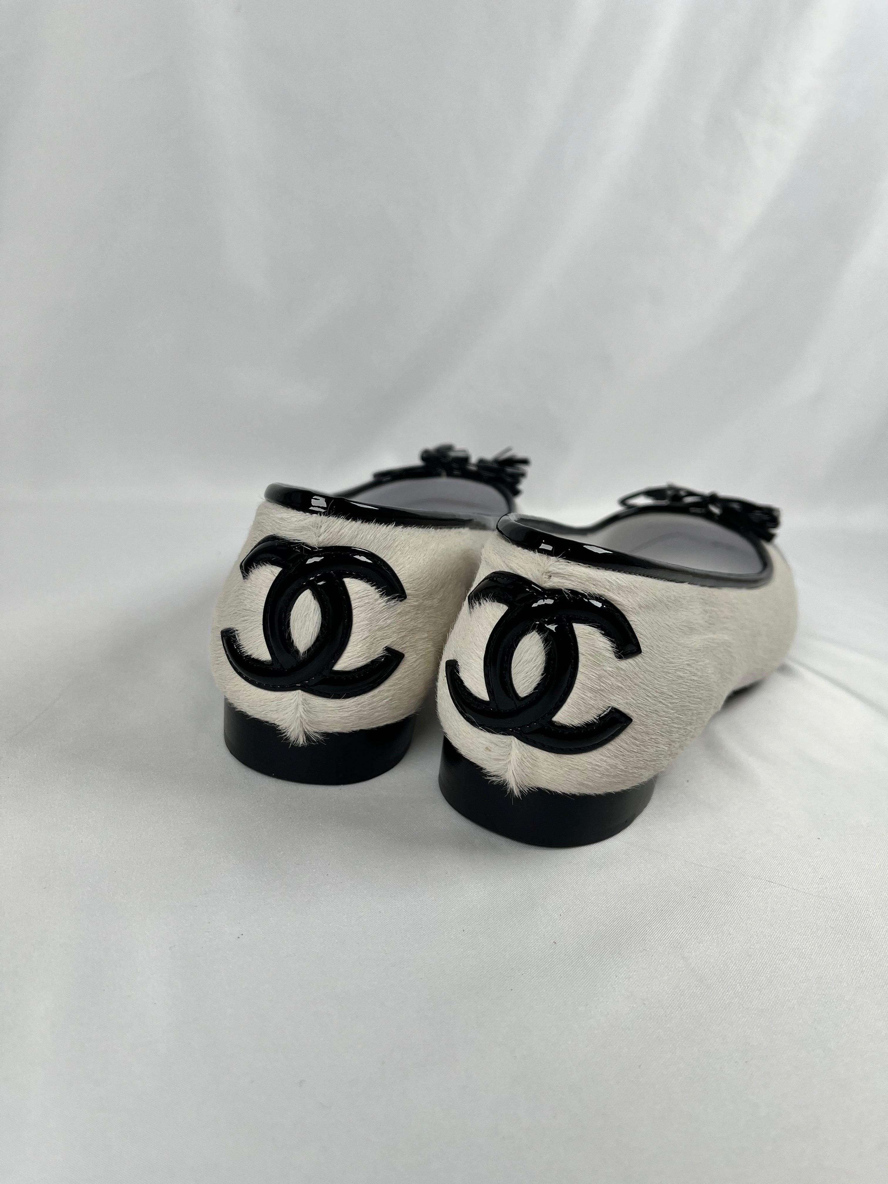 Pre-Owned CHANEL™ Pony Hair Cap Toe Black/White Flats, 40
