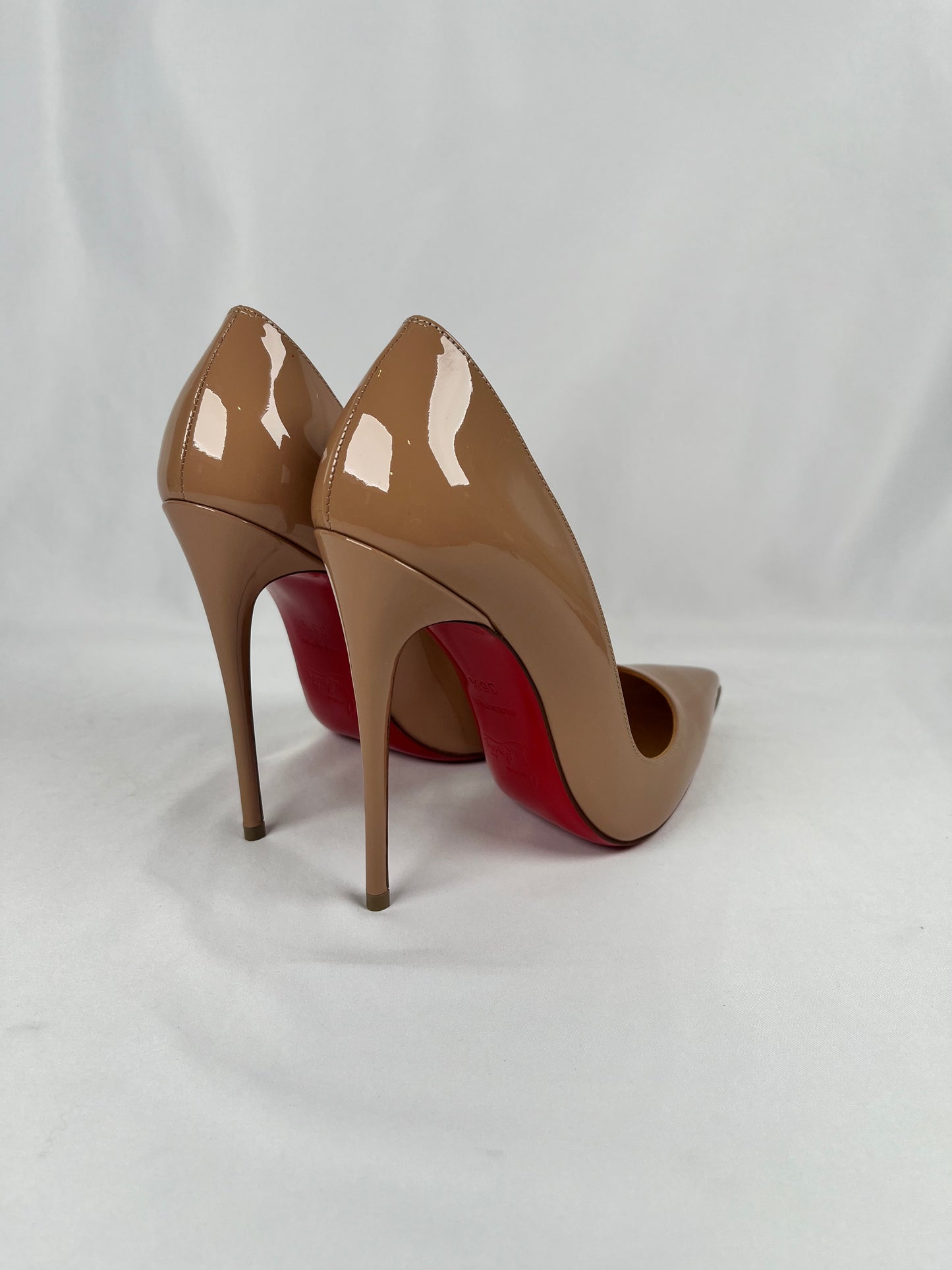 Pre-Owned CHRISTIAN LOUBOUTIN So Kate Nude Pumps, 36.5