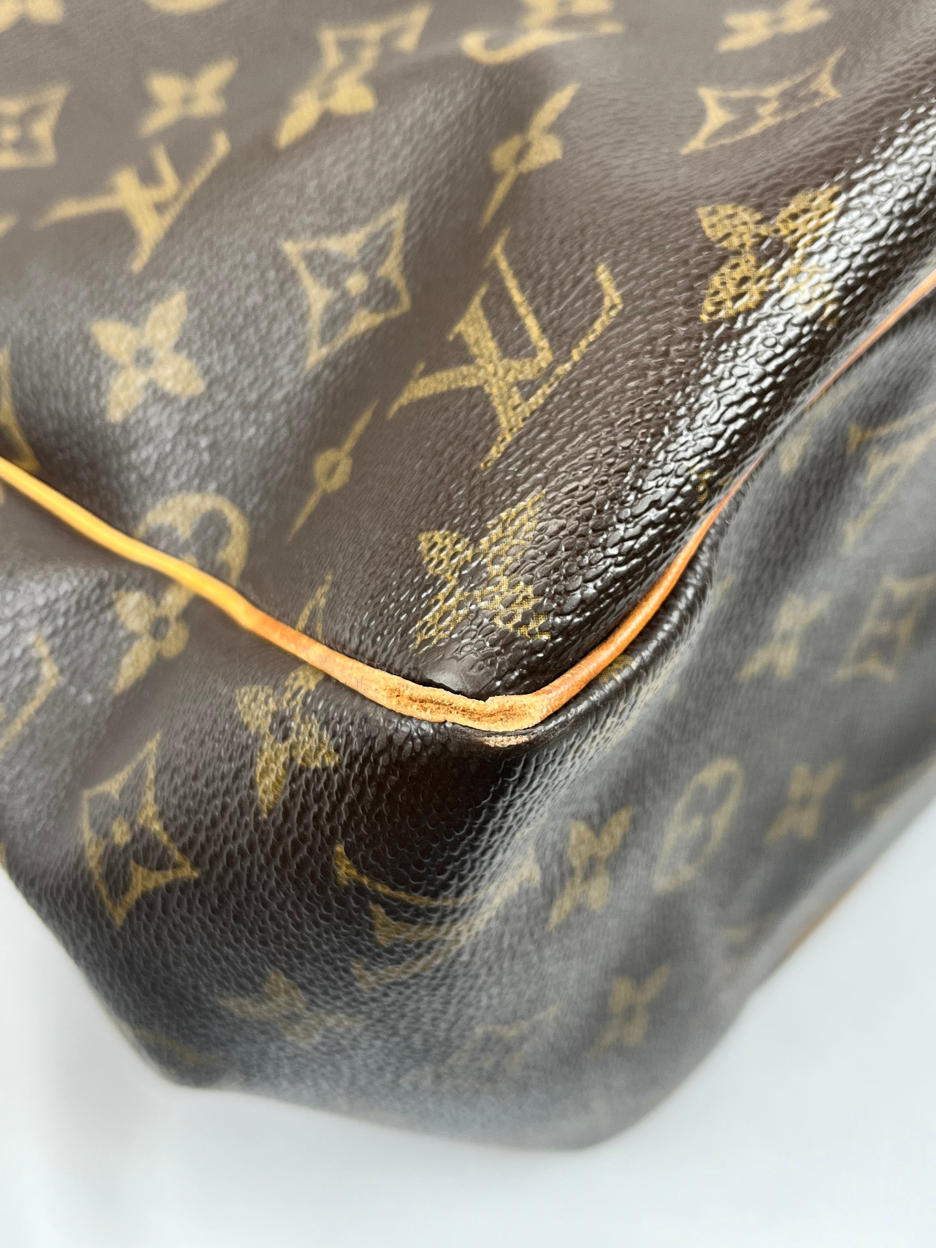 Pre-Owned LOUIS VUITTON Vertical Batignolles Monogram Handbag